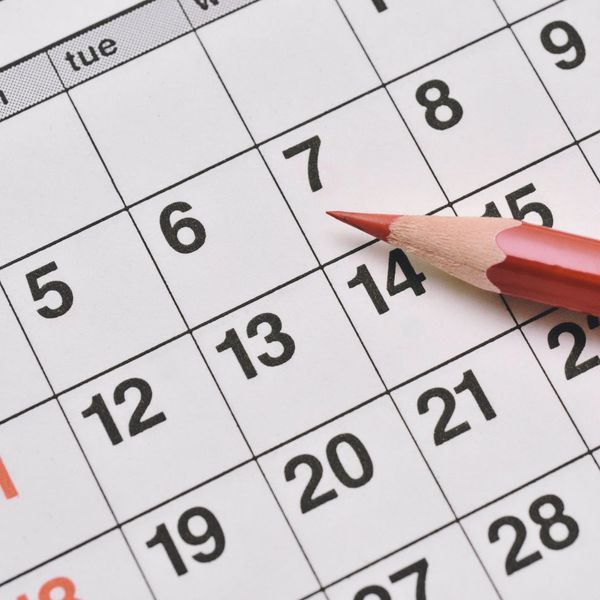 Calendar with a red pencil marking a date