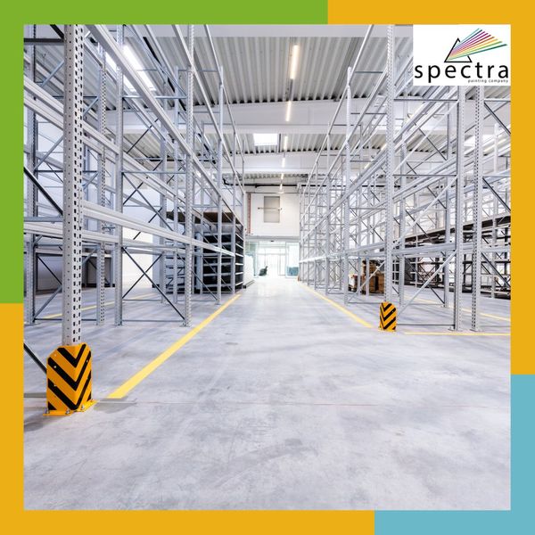 Empty warehouse with painted yellow lines, ready for use