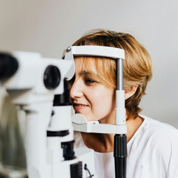 woman doing an eye exam
