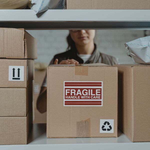 box on a shelf labeled fragile