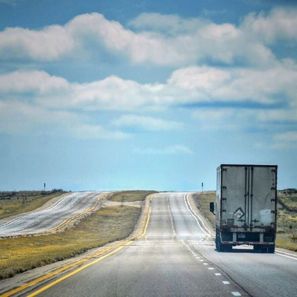 truck driving down road