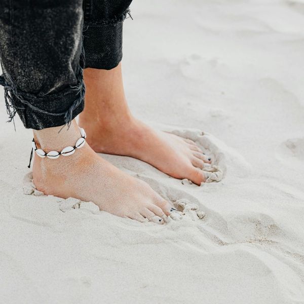 feet in the sand