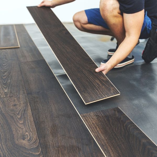 vinyl flooring being installed