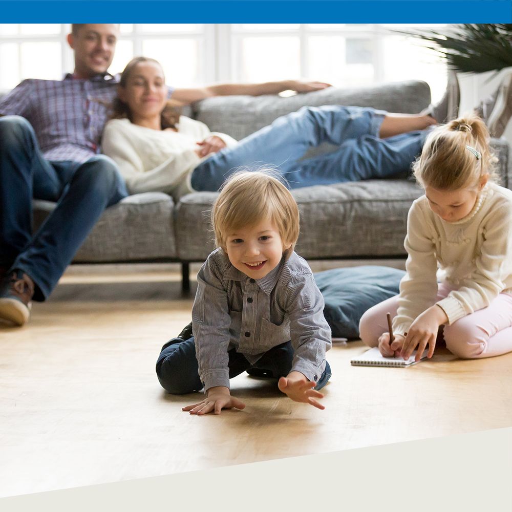 family relaxing in living room