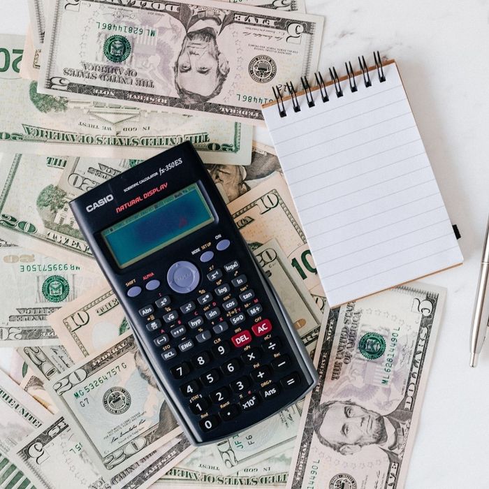 A calculator on top of money