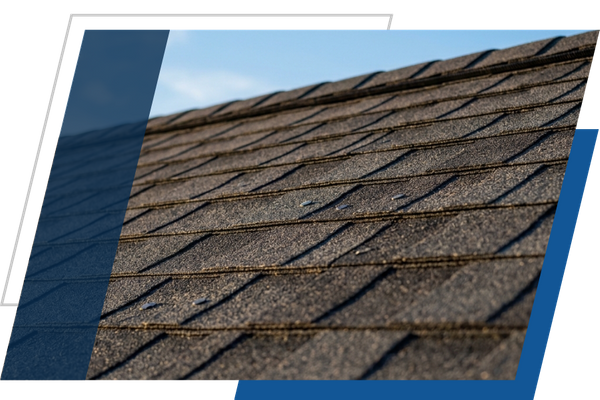 Close-up view of durable Owens Corning architectural shingles installed on a residential roof slope.