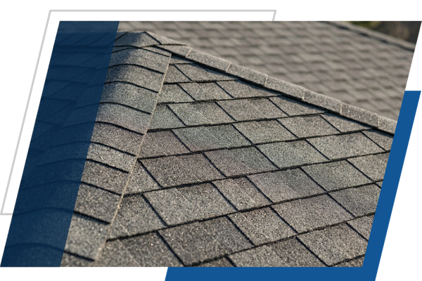 Close-up view of newly laid architectural shingles installed on a residential roof.