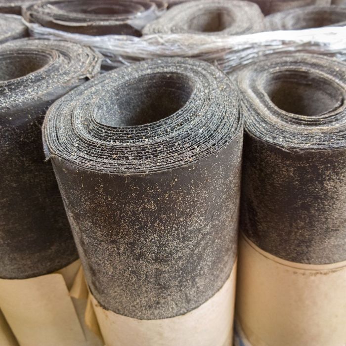 Rolls of roofing materials. 