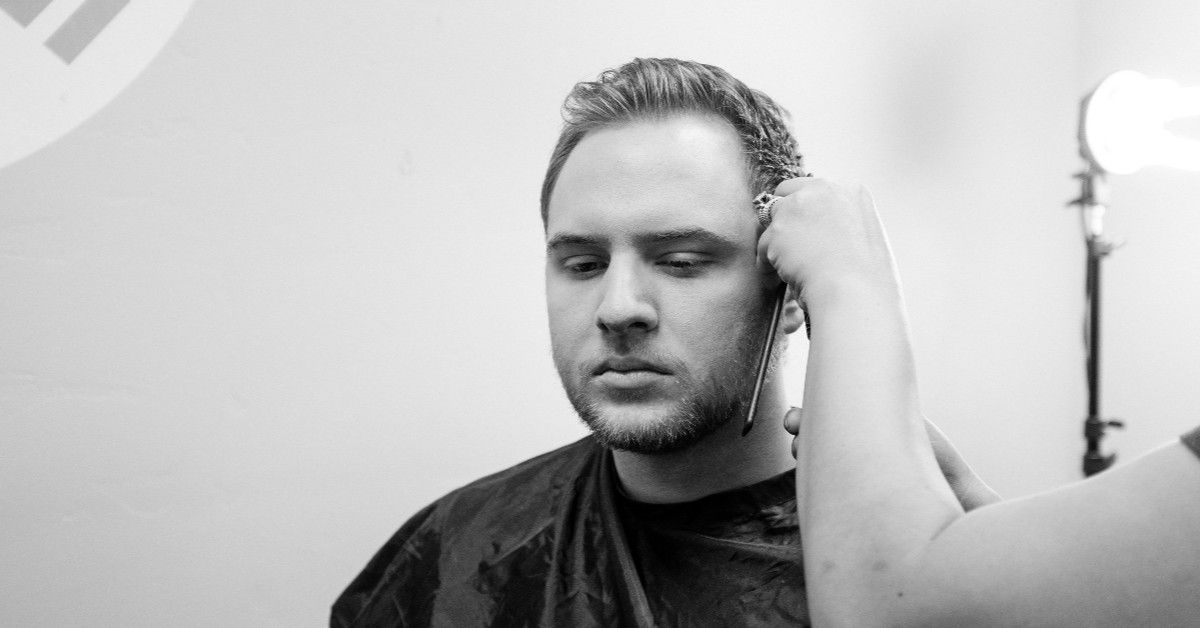 Image of a client getting his hair done