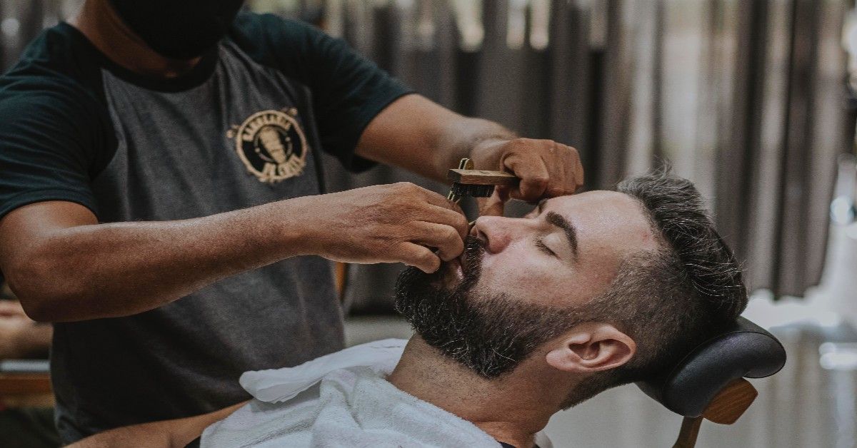 Image of a client getting his hair done