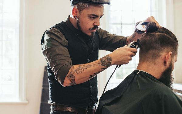 Image of a client getting his hair done