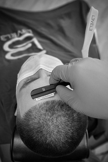 Image of a person getting a hair cut