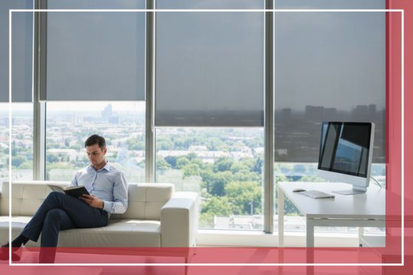Bright sunlight streaming through a window, demonstrating solar control and glare reduction as the light hits an interior hardwood floor.