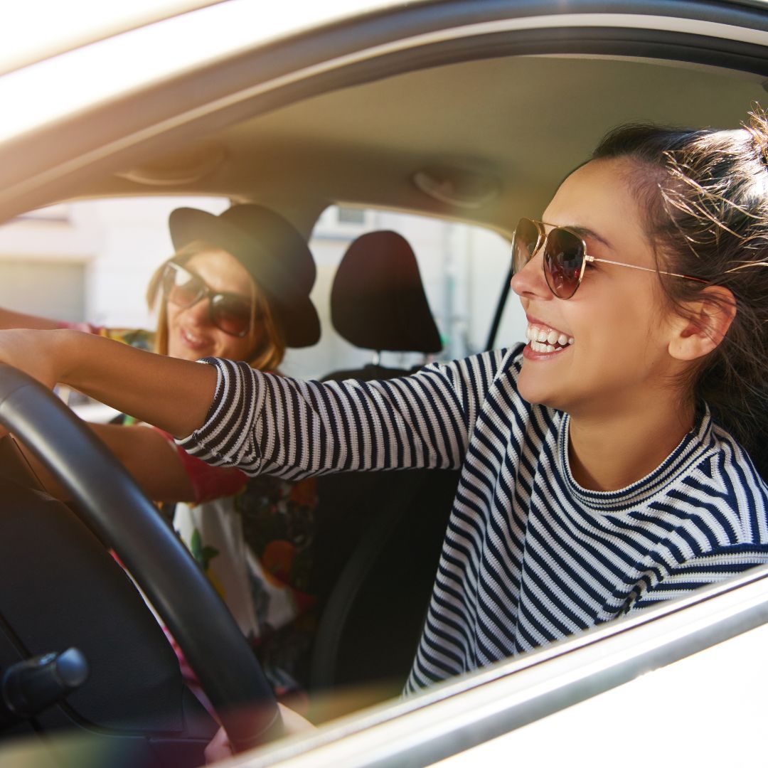 happy women in car