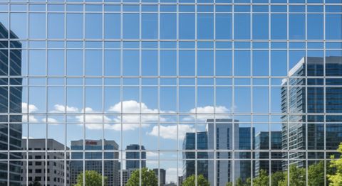 buildings reflected in windows