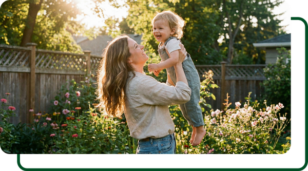 Mother lifting her child
