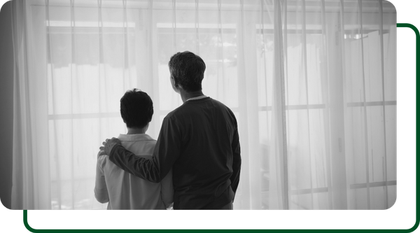 Couple looking out a window