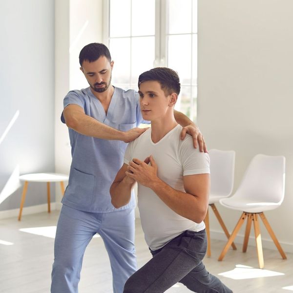 physical therapist with patient