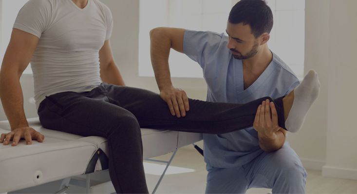person doing physical therapy on a knee