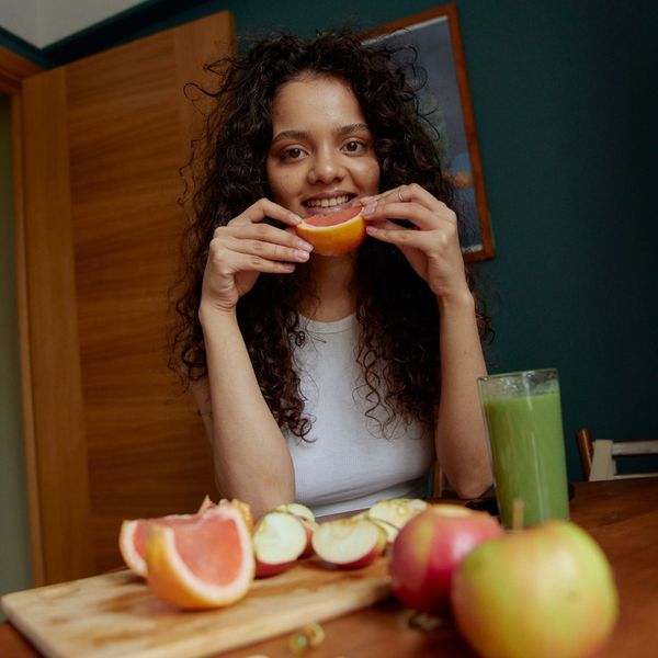 woman eating fruit