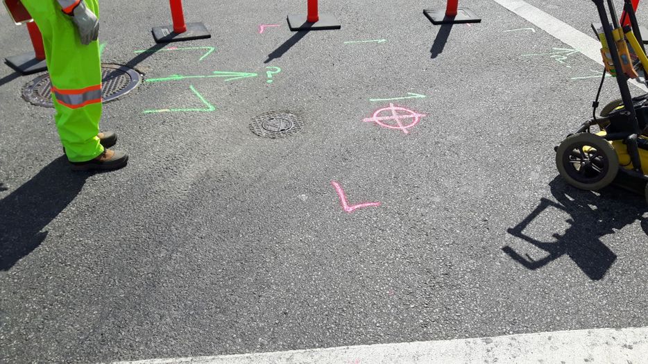 Marking utility lines in parking lot