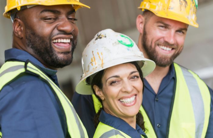 men and woman in a hard hat