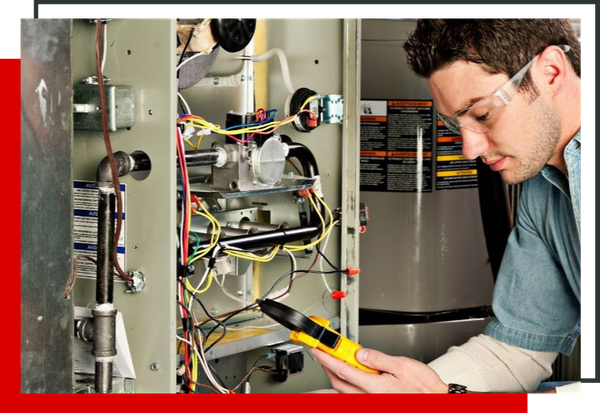 technician working on a furnace