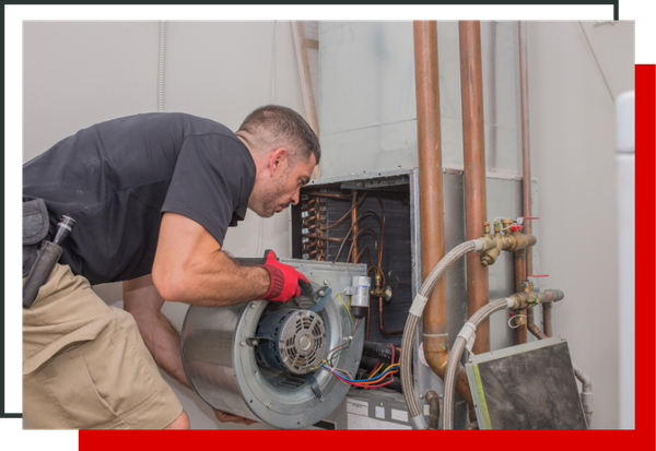 tech working on a furnace