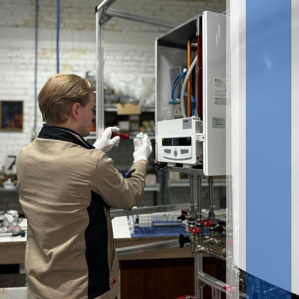 an hvac technician working on a furnace
