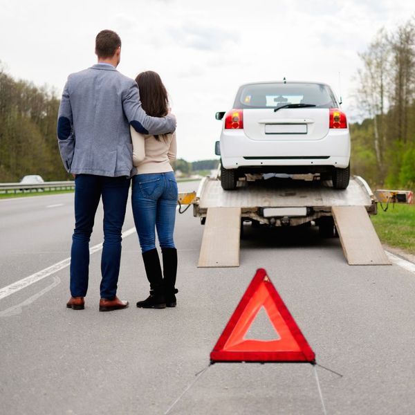 couple having their car towed