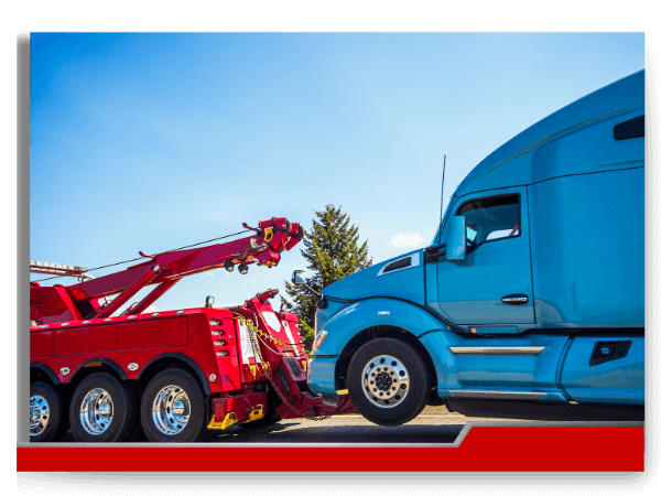 semi-truck being towed