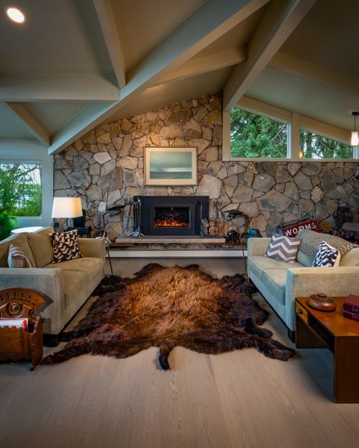 bison buffalo hide in front of fireplace