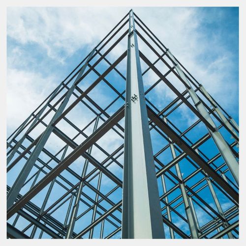 view from below of steel building in construction