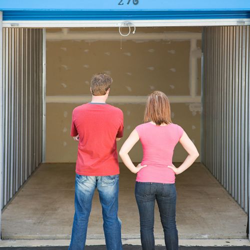 people looking at storage unit