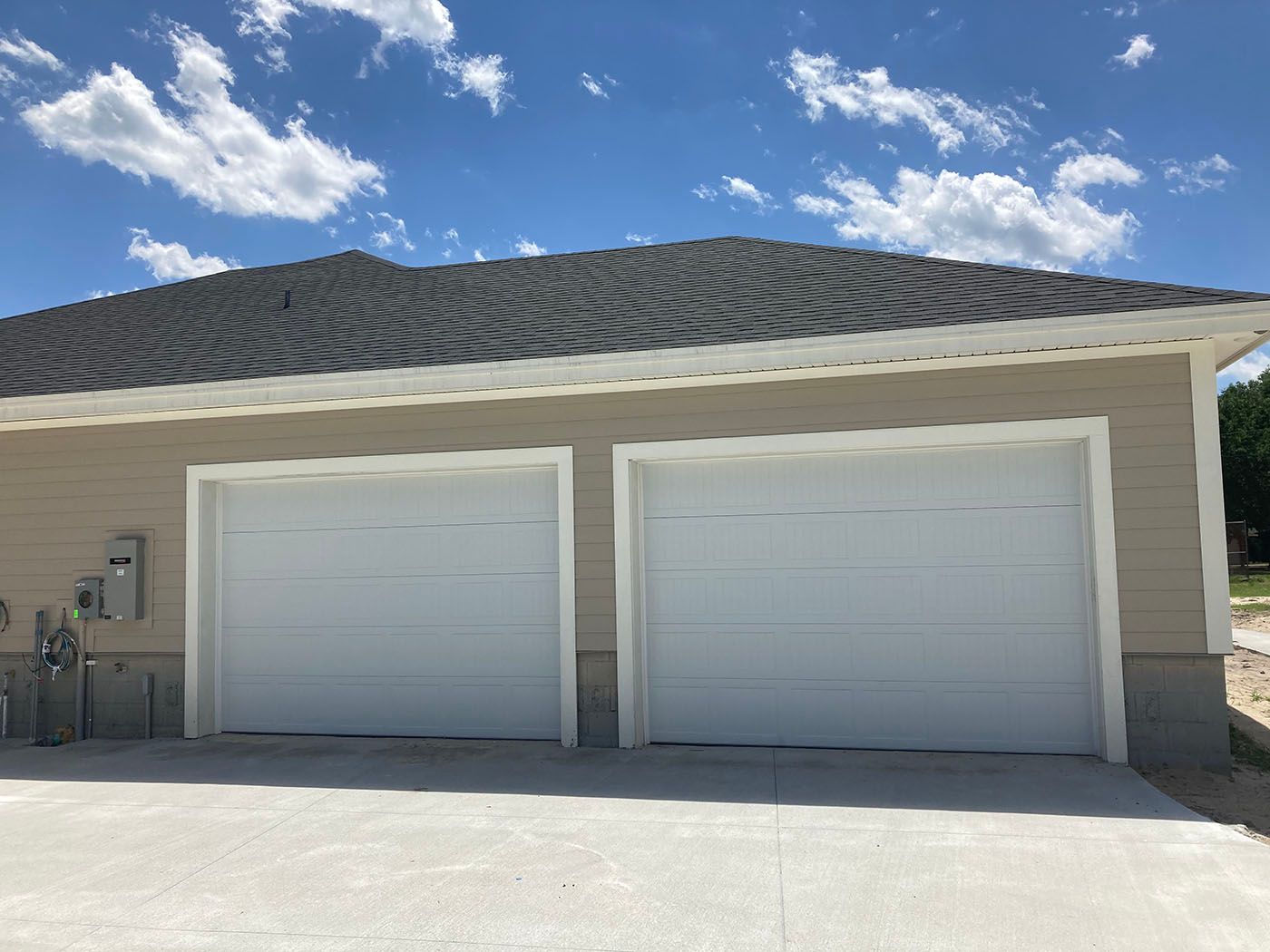 Two garage doors in house