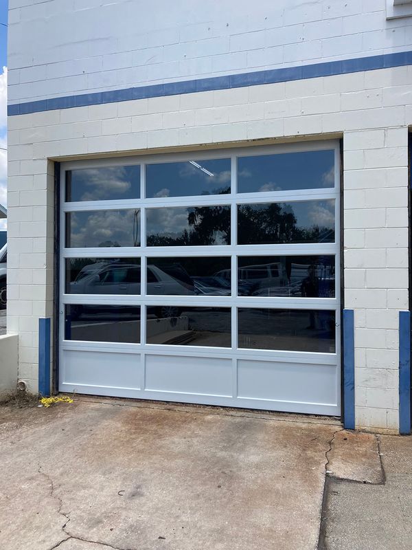 Glass commercial garage door