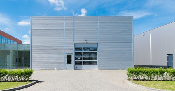 Metal commercial building with garage door