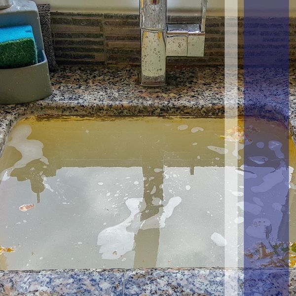 image of a clogged sink