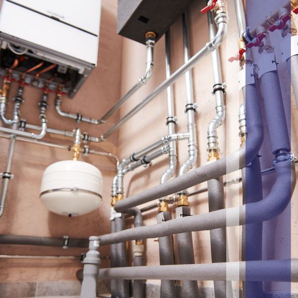 elaborate network of pipes, tankless water heater etc