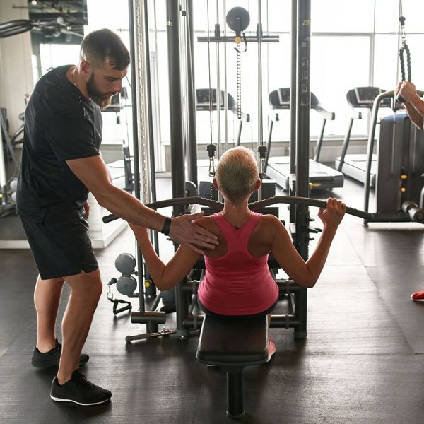female working out with personal trainer