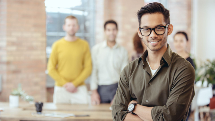 smiling man in glasses