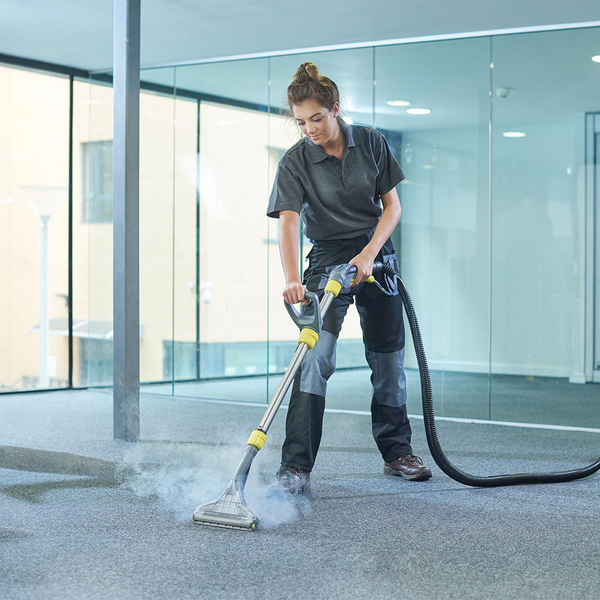 woman cleaning carpet