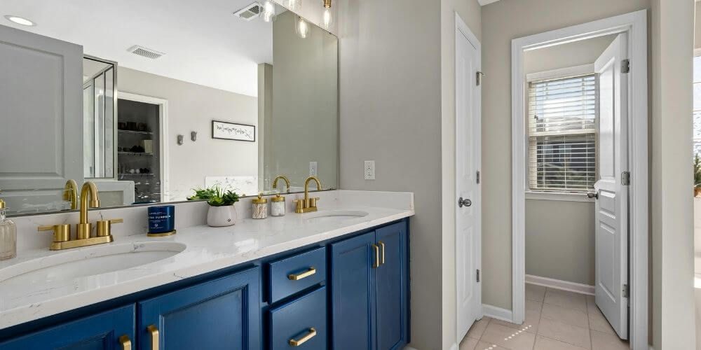 bathroom with blue vanity