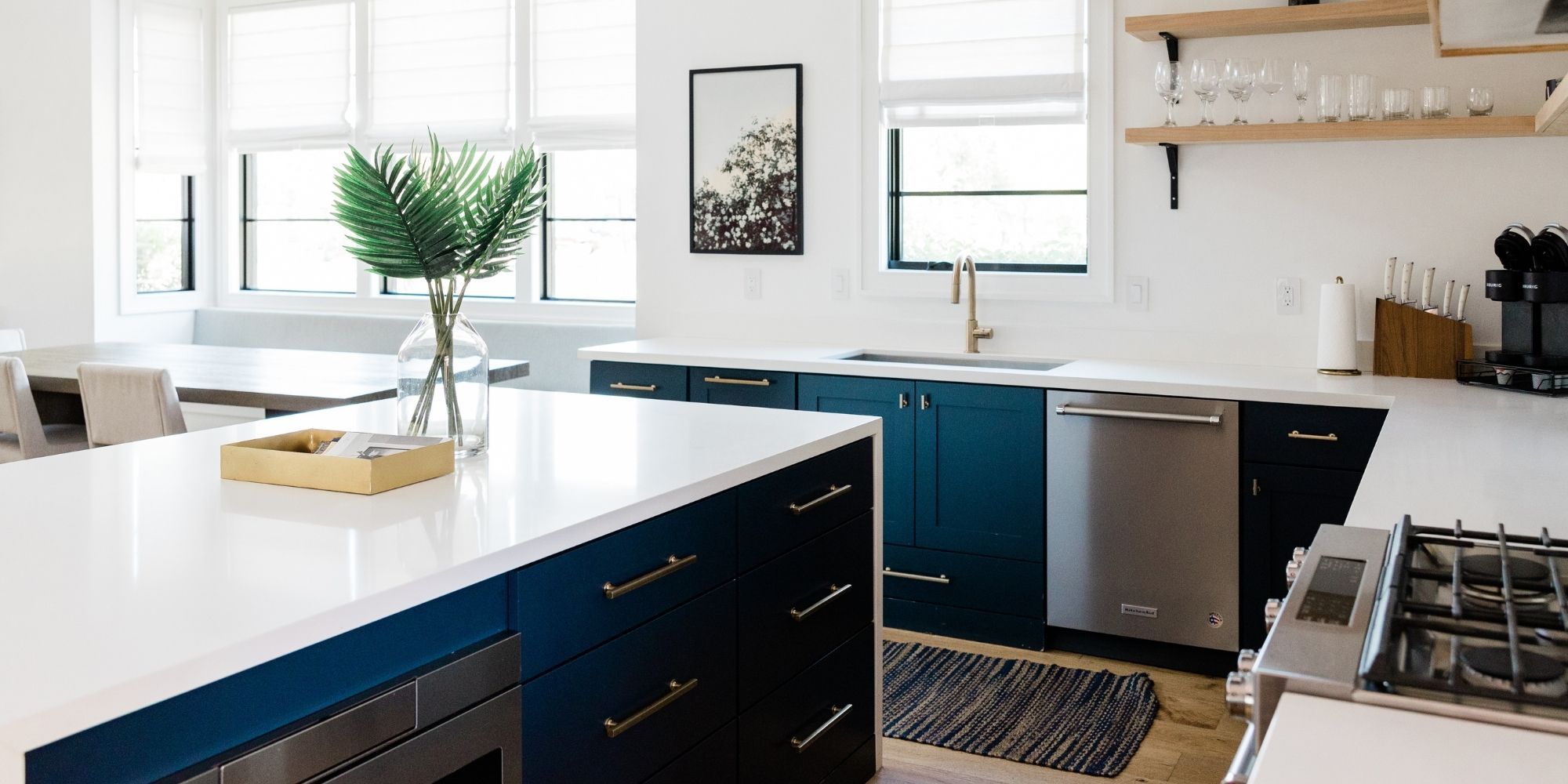 beutiful remodeled kitchen with dark blue cabinets and white quartz countertops beautiful remodeled kitchen with dark blue cabinets and white quartz countertops