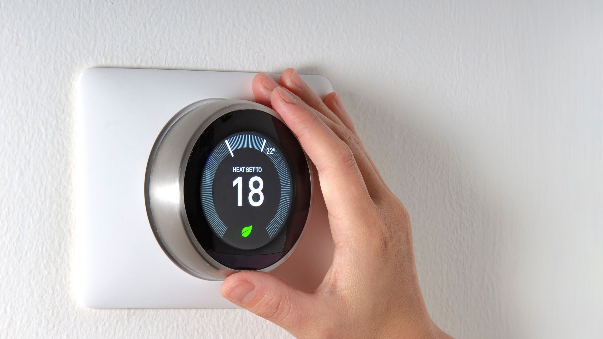 adjusting a smart thermostat adjusting a smart thermostat