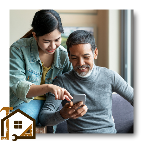 smiling couple looking at phone
