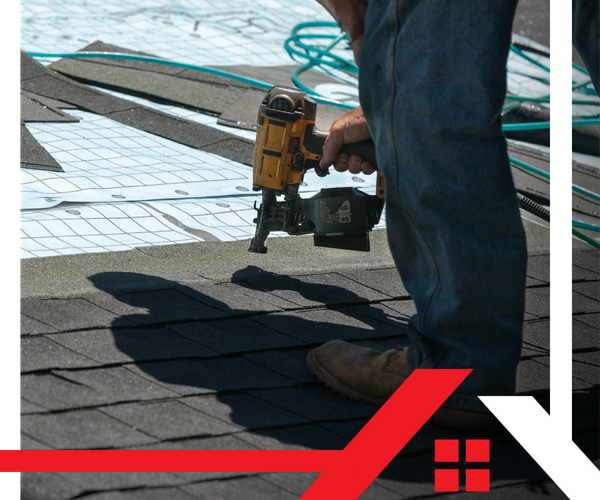 crew member working on a residential roof