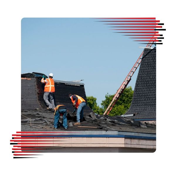 Team of roofers working on a project