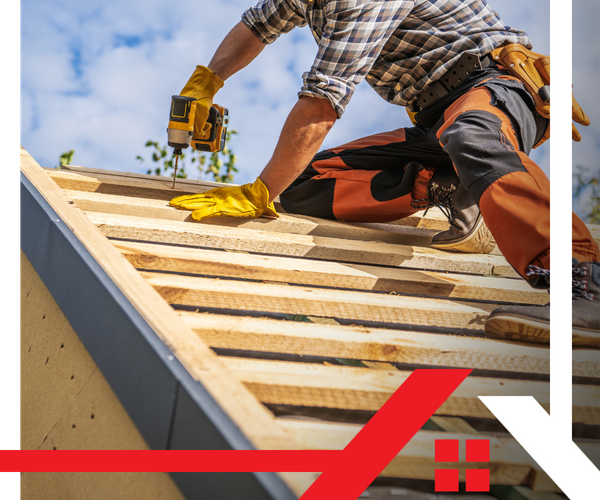 crew member working on a residential roof