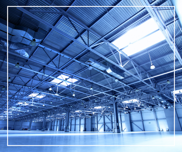 The inside of a nice industrial facility with a new-looking roof